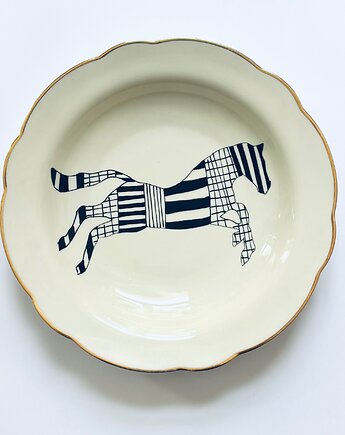 Koń w locie, arent plates