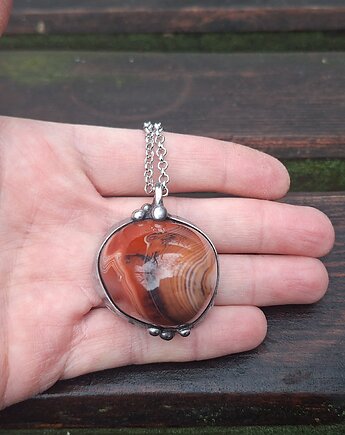 Żywe kultury bakterii - wisiorek, po drugiej stronie lustra