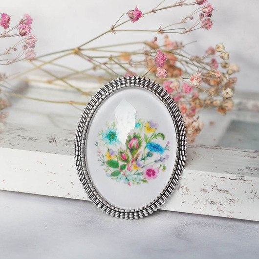 broszki BROSZKA ''bukiecik", duża, efektowna, motywem graficznym