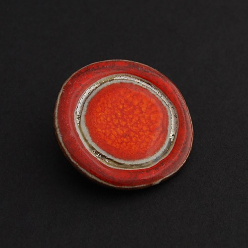 Orange in red Dorca