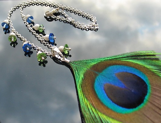 pawie pióro i kryształ Swarovski Stella