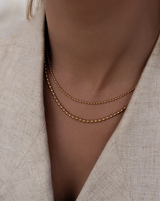 złote naszyjniki Delikatny złoty naszyjnik kuleczkowy ze stali chirurgicznej Paraiso Eirene