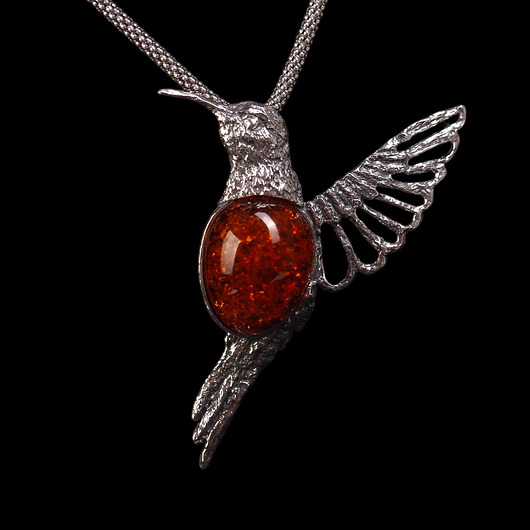 wisiory Duży wisior srebrny ptak z bursztynem koniakowym