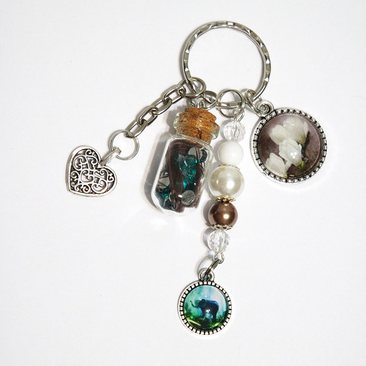 breloki Breloczek - Magnolia, słoń, piórko