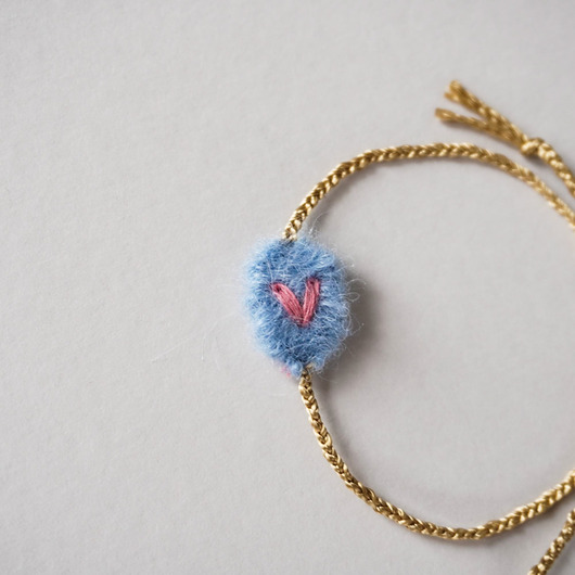 bransoletki - inne Tkana bransoletka z serduszkiem z regulowanym zapięciem