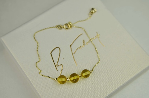 bransoletki złote Delikatna złota bransoletka z bursztynami pr. 585