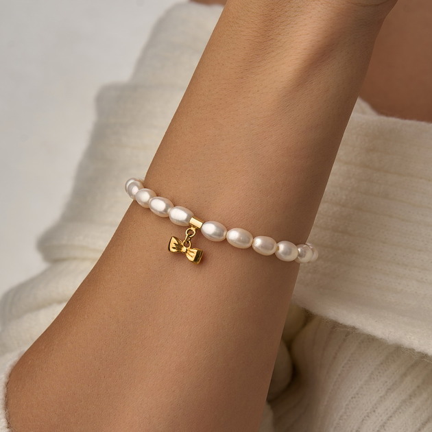 bransoletki z kamieni naturalnych Bransoletki perły naturalne kokardka- srebro 925 pozłacane