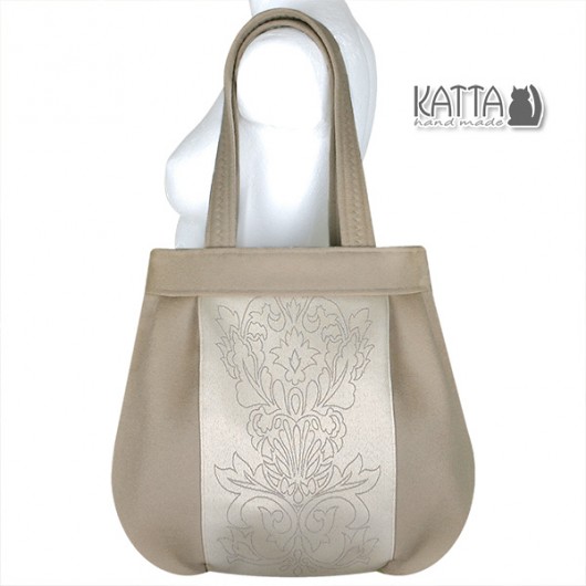 Piaskowe ornamenty Katta