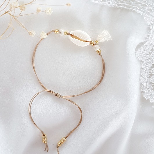 bransoletka z muszelką kauri LEI handmade 