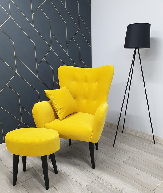 fotele Fotel  uszak skandynawski z podnóżkiem żółty