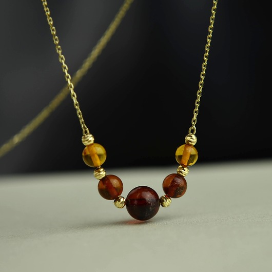 złote naszyjniki Złoty naszyjnik z koniakowym bursztynem pr. 585