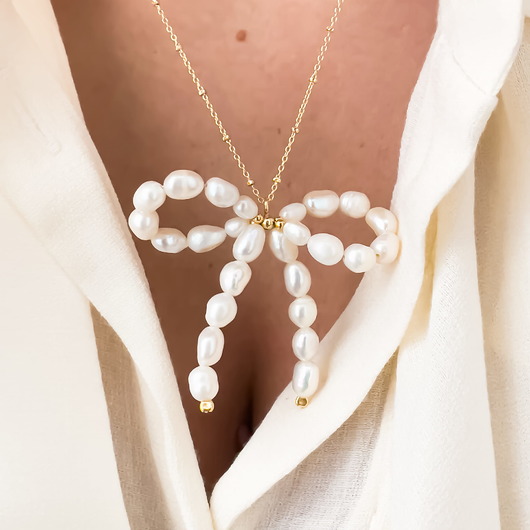 złote naszyjniki Naszyjnik kokardka z pereł