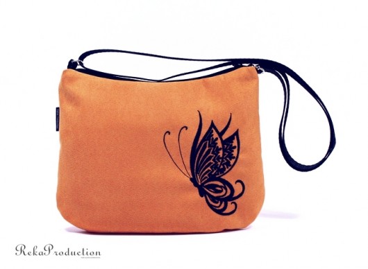 black butterfly on orange RękaProduction