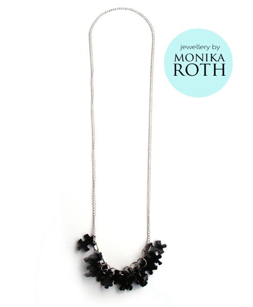PuzzLove czarne /DeLuxe Monika Roth