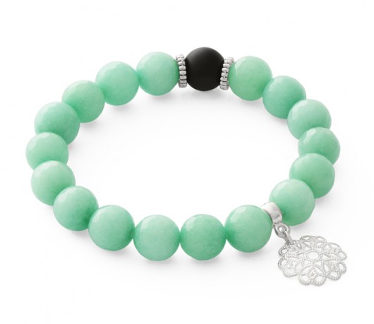 Light green jade with black point & flower. Lavoga