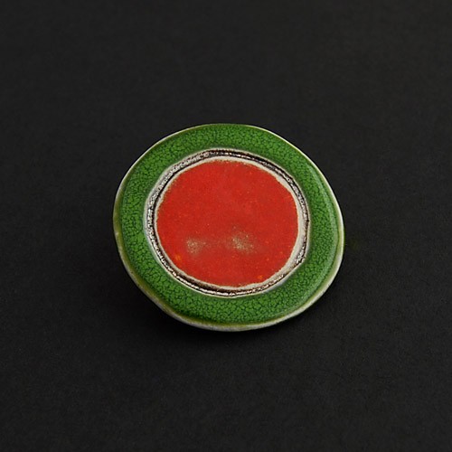 Orange in green Dorca