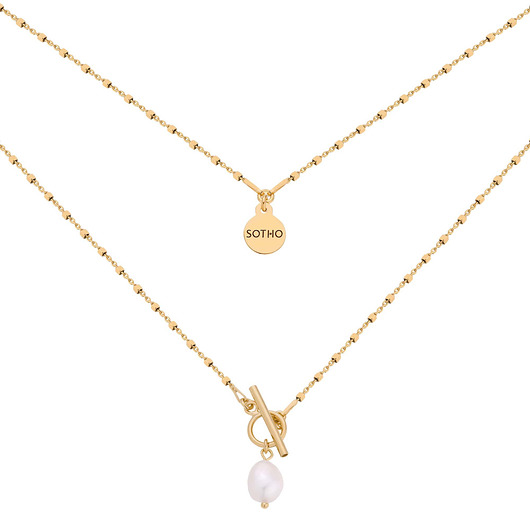 złote naszyjniki Złoty kosteczkowy naszyjnik z ozdobnym zapięciem i perłą