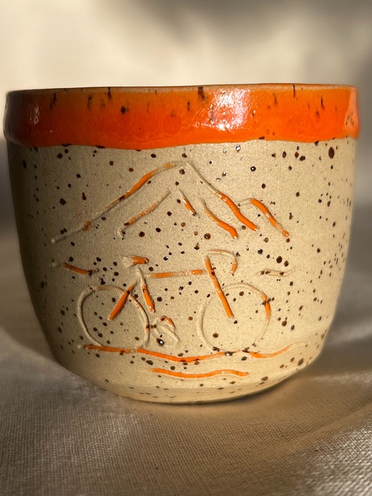 kubki Czarka z rowerem pomarańczowa