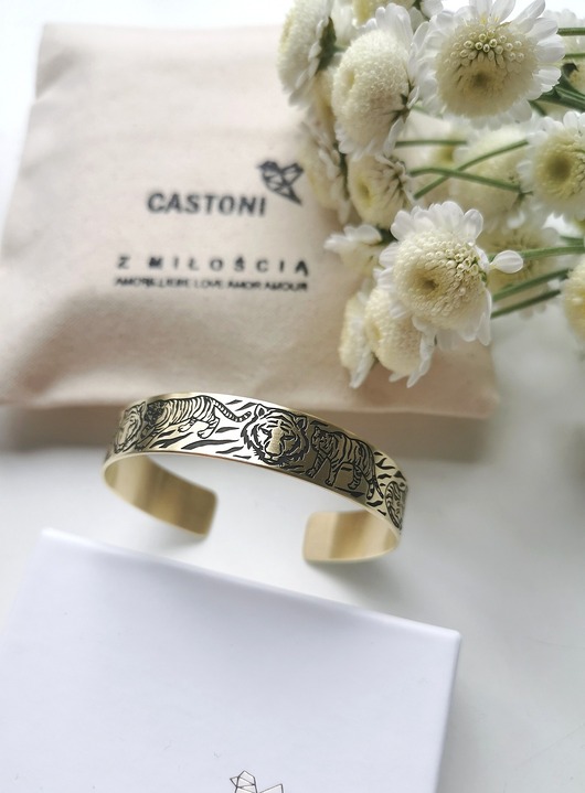 bransoletki złote The eye of the tiger