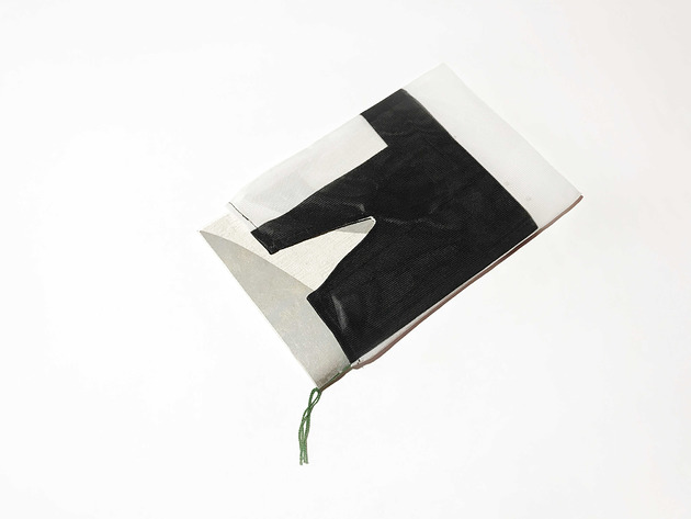 NET PACK  pokrowiec na notatnik/książkę Wastebooks