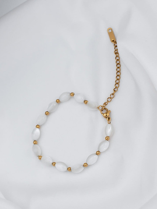 bransoletki złote Perłowa bransoletka Aria ze stali chirurgicznej pozłacana 18k