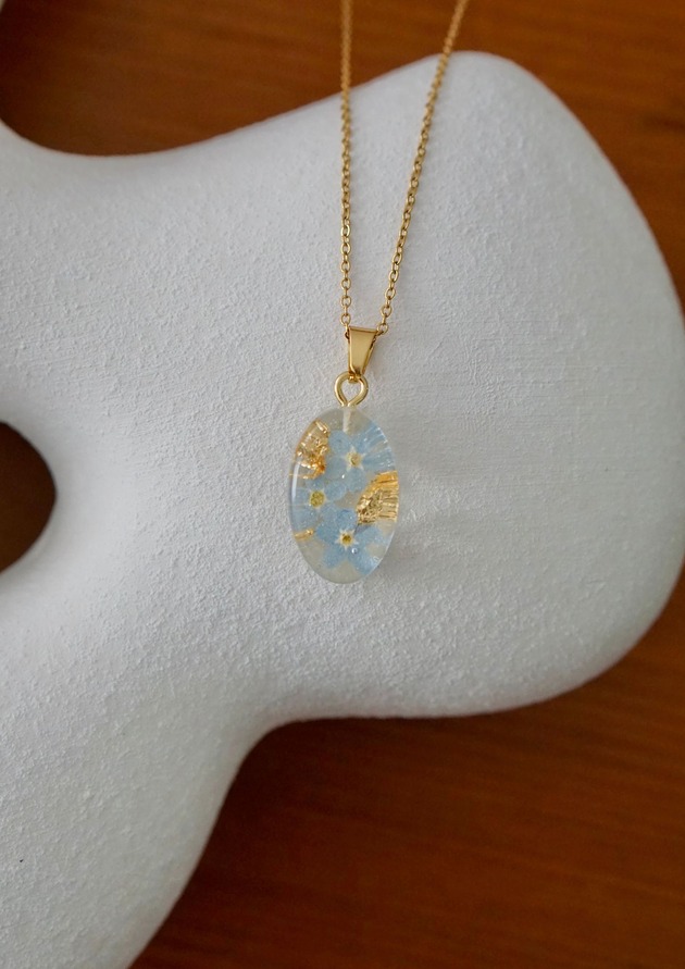 złote naszyjniki Naszyjnik z niezapominajką