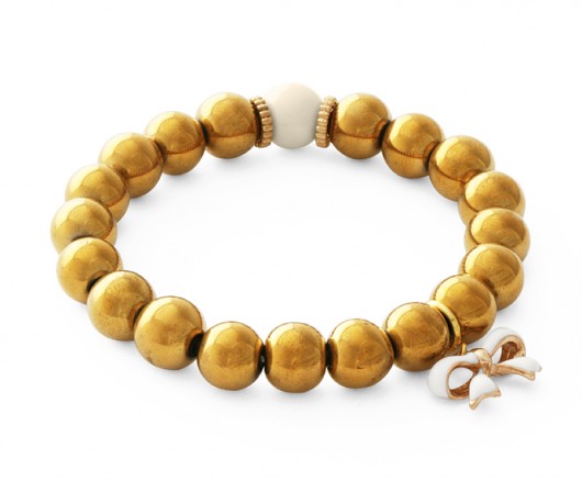 Golden hematite with ivory point & bow pendant. Lavoga