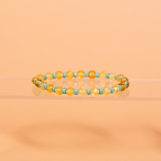 bransoletki - inne Bransoletka z fasetowanym bursztynem bałtyckim