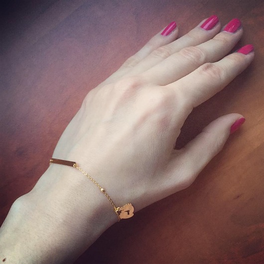 Pozłacana bransoletka ze stópkami VENA Jewellery