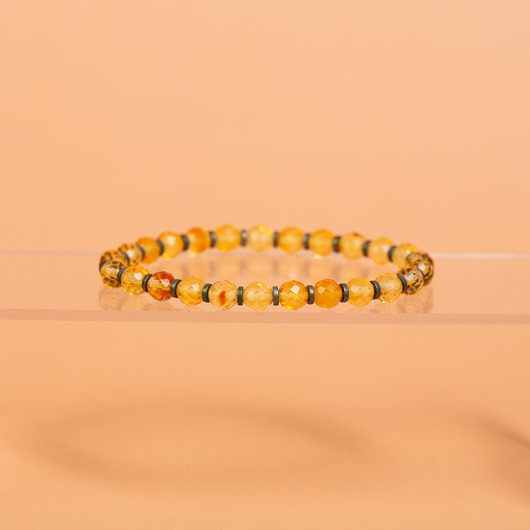 bransoletki - inne Bransoletka z fasetowanym bursztynem bałtyckim