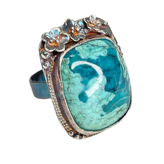 pierścionki srebrne Srebrny pierścień z turkusem w kwiatowej oprawie