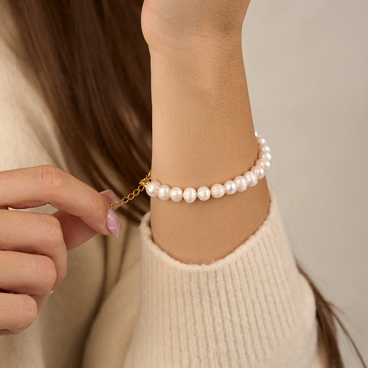 bransoletki złote Bransoletka z naturalnych pereł - srebro 925 pozłacane