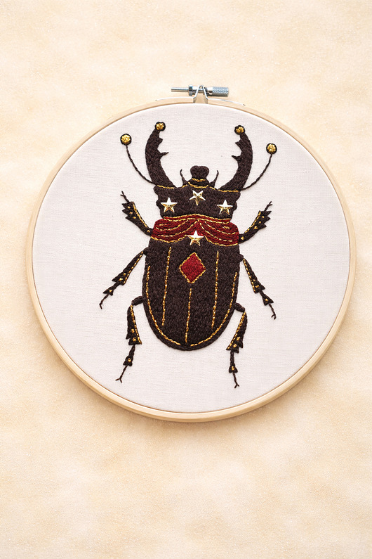 Ozdoby na ścianę Chrząszcz z Magicznego Cyrku.