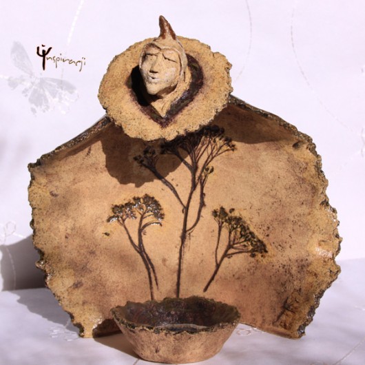 Ceramiczna rzeźba - On w brązach w inspiracji