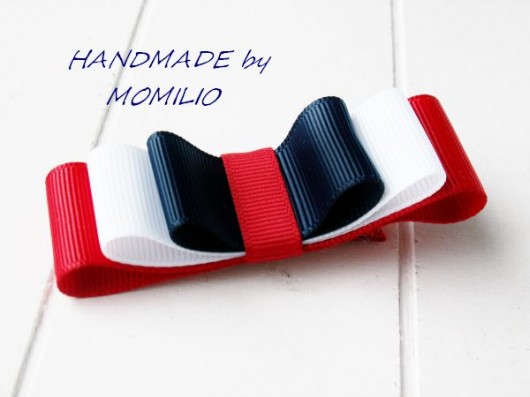 Momilio spinka kokarda Momilio