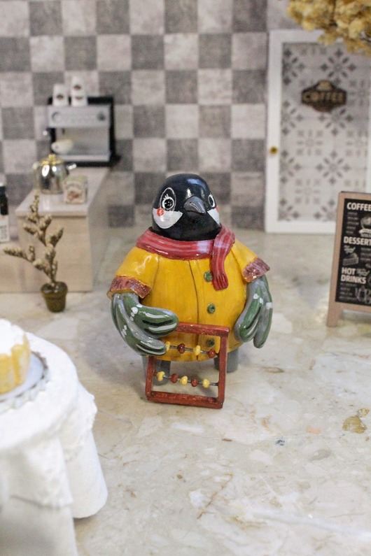 figurki i rzeźby Sikorka z liczydłem