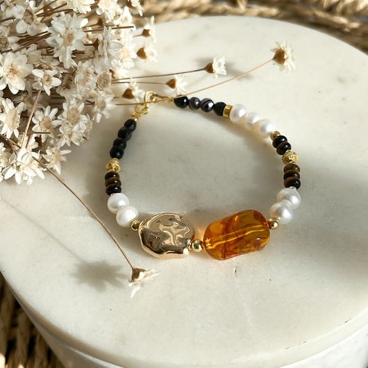 bransoletki z kamieni naturalnych Bransoletka z perłami i tygrysim okiem