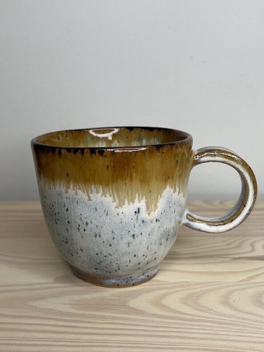 kubki Kubek kremowy w piegi