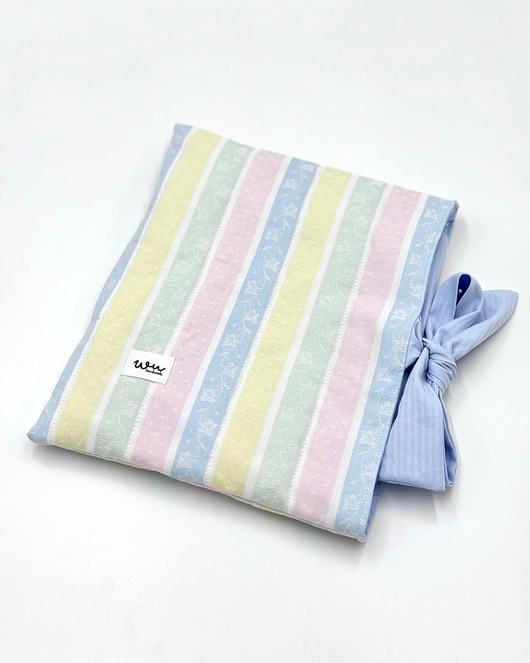 pokrowce i etui - różne Otulacz na książkę Pastele