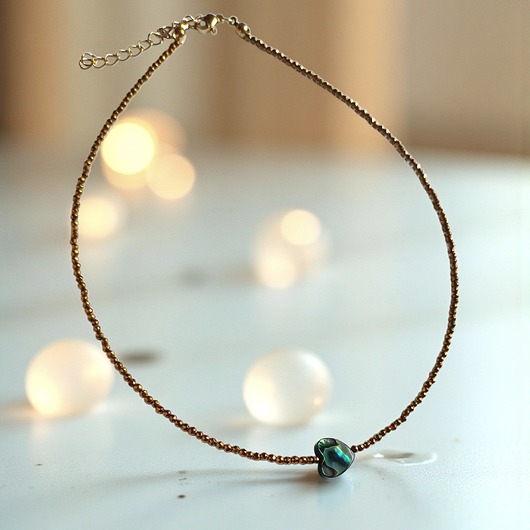 chokery Choker z serduszkiem : muszla PAUA, hematyt złoty