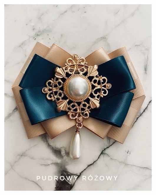 broszki Brosza z ażurową ozdobą z perłą NEW