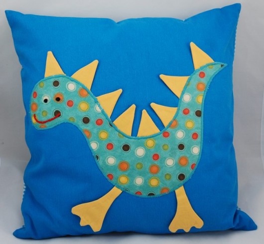 dinozaur w grochy iasio
