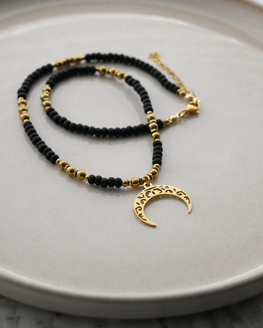 chokery Czarno-złoty naszyjnik choker z lunulą