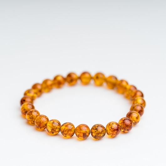bransoletki z kamieni naturalnych Bransoletka bursztyn koniakowy kulka regularna