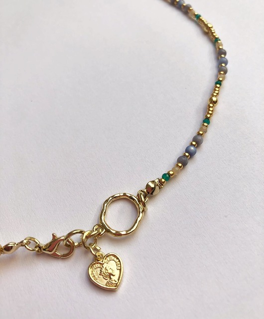 chokery Asymetryczny choker z kamieniami