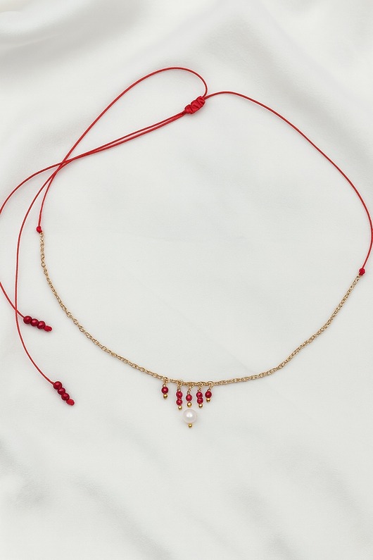 złote naszyjniki Naszyjnik czerwony sznurek z różową perłą