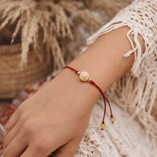 bransoletki na sznurku Bransoletka ochronna sznurkowa z bursztynem bałtyckim