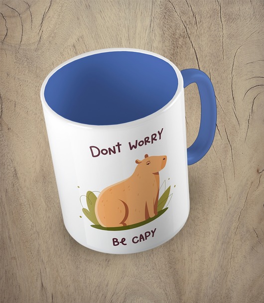 kubki Kolorowy kubek z hasłem Don't worry be capy - mix kolorów