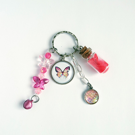 breloki Breloczek - motyl, piórko