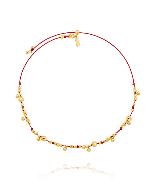 złote naszyjniki Naszyjnik na czerwonym sznureczku z pozłacanymi kuleczkami
